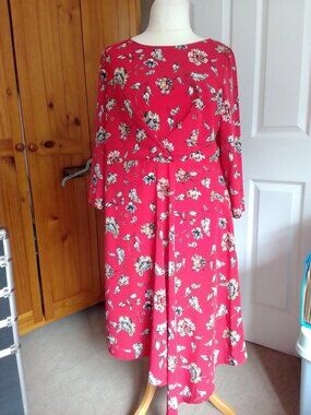 A George dress with a red floral pattern